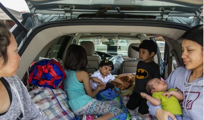 family living in car